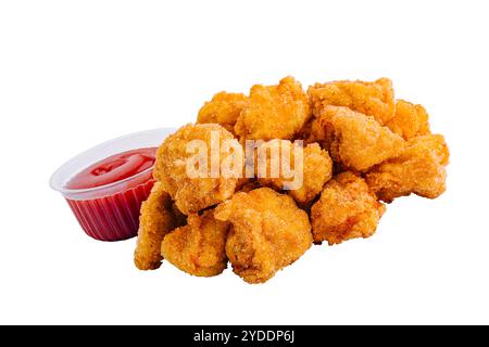 Pepite di pollo con salsa isolata su bianco Foto Stock