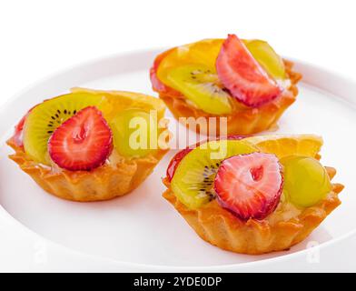 Mini crostate con panna e un mix di frutta estiva Foto Stock