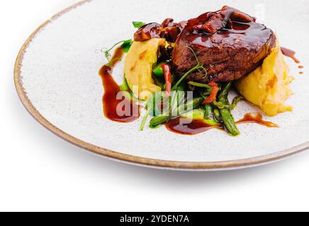 Bistecca con purè di patate e fagiolini Foto Stock