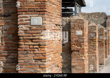 Strade in rovina la città romana di Pompei a Pompei Scavi, vicino napoli, Italia meridionale. Foto Stock