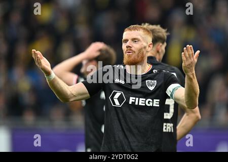 Brunswick, Germania. 27 ottobre 2024. Calcio: Bundesliga 2, Eintracht Braunschweig - Preußen Münster, Matchday 10, Eintracht Stadium. Gesticolazioni di Mikkel Kirkeskov di Münster. Crediti: Swen Pförtner/dpa/Alamy Live News Foto Stock
