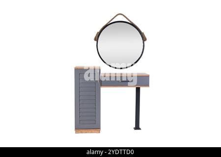 Moderno tavolo vanity con specchio rotondo, armadio grigio e accenti in legno - mobili eleganti e funzionali per camera da letto o bagno Foto Stock