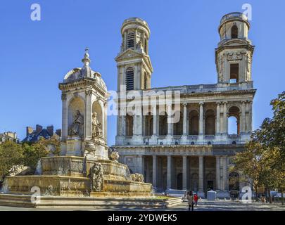 Chiesa Saint-Sulpice è una chiesa cattolica romana di Parigi, in Francia. Vista della facciata con fontana Foto Stock