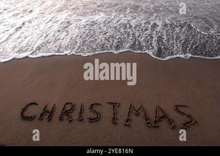 Iscrizione di Natale 2005 sulla spiaggia estiva Foto Stock