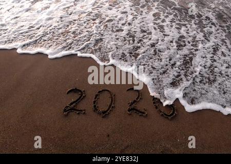 Iscrizione di Natale 2005 sulla spiaggia estiva Foto Stock
