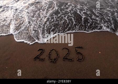 Iscrizione di Natale 2005 sulla spiaggia estiva Foto Stock