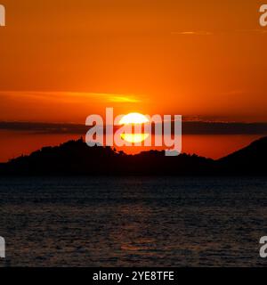 Tramonto sul Tribunj, tratto da Srima in Croazia Foto Stock