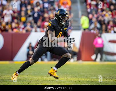 Landover, Maryland, Stati Uniti. 27 ottobre 2024. Il linebacker dei Washington Commanders Frankie Luvu (4) durante la partita tra Chicago Bears e Washington Commanders giocata a Landover, Maryland. Cory Royster/Cal Sport Media/Alamy Live News Foto Stock