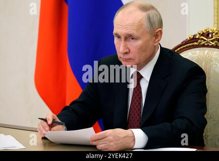 Il presidente russo Vladimir Putin tiene il Consiglio presidenziale per la società civile e i diritti umani a Mosca, Russia, lunedì 4 dicembre 2023. Foto Stock