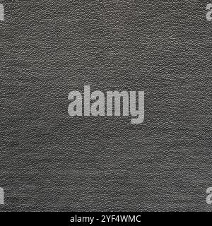 Colore grigio scuro sintetico, pelle nera per sfondo. Immagine di primo piano materiale decorativo texture immagine, sfondo motivo per il design Foto Stock