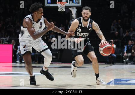 Isaia Cordinier (Virtus Bologna) (R) in azione contrastata da Christian Vital (Tortona) durante la partita del campionato italiano di basket della serie A1 LBA tra Segafredo Virtus Bologna e Bertram Derthona Tortona all'Unipol Arena, Casalecchio (Bologna), Italia, 06 novembre 2024 - foto: Michele Nucci Foto Stock