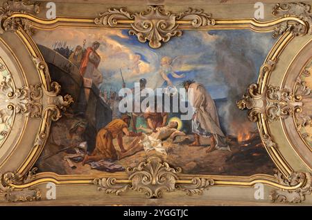 ALESSANDRFIA, ITALIA - 11 SETTEMBRE 2024: L'affresco neo-barocco del Martirio del matyr paleocristiano nella chiesa di San Alessandro Foto Stock