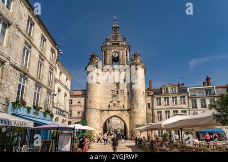 La torre dell'orologio porte de la grosse Horloge a la Rochelle, Francia, Europa Foto Stock