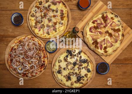 Le pizze gourmet e Signature gli chef e le pizzerie gourmet sperimentano costantemente nuovi ingredienti e combinazioni, per una maggiore sofista Foto Stock