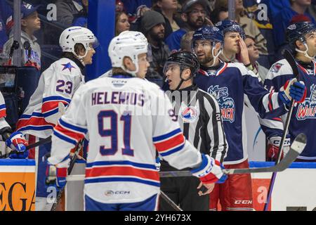 Rochester, New York, Stati Uniti. 8 novembre 2024. Il difensore del Hartford Wolf Pack Ben Harpur (5) il difensore di Rochester Americans Ryan Johnson (23) si scambiano parole nel secondo periodo. I Rochester Americans ospitarono l'Hartford Wolf Pack in una partita della American Hockey League alla Blue Cross Arena di Rochester, New York. (Jonathan Tenca/CSM). Crediti: csm/Alamy Live News Foto Stock