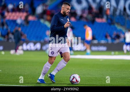 Getafe, Madrid, Spagna. 10 novembre 2024. David Lopez del Girona FC si scalda durante la partita di calcio della Liga EA Sports 2024/25 tra Getafe CF vs Girona FC all'Estadio Coliseum il 10 novembre 2024 a Getafe, Spagna. (Credit Image: © Alberto Gardin/ZUMA Press Wire) SOLO PER USO EDITORIALE! Non per USO commerciale! Foto Stock