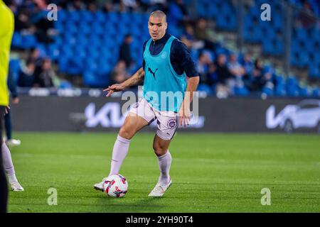 Getafe, Madrid, Spagna. 10 novembre 2024. L'Oriol Romeu di Girona FC si scalda durante la partita di calcio della Liga EA Sports 2024/25 tra Getafe CF e Girona FC all'Estadio Coliseum il 10 novembre 2024 a Getafe, Spagna. (Credit Image: © Alberto Gardin/ZUMA Press Wire) SOLO PER USO EDITORIALE! Non per USO commerciale! Foto Stock