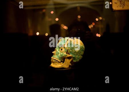 Jade encrusted skull from the tomb VII of Monte Alban displayed in the Museum of Oaxacan Cultures in Santo Domingo former monastery in Oaxaca, Mexico. Stock Photo