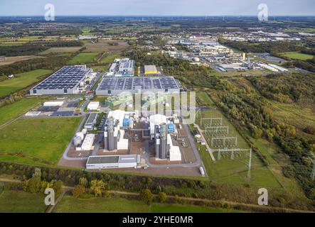 Luftbild, Gewerbegebiet Trianelstraße mit picnic Logistik und Arvato Logistikdienst, Solardach, Deutsche Post DHL Zustellzentrum Hamm, Reiling Kunststoff Recycling GmbH, Trianel Gaskraftwerk Hamm GmbH, hinten das Gewerbegebiet Frielinghauser Straße mit EVERLAM Chemiewerk, DuPont Uentrop und Duentrop und Windräder Nordrhein-Westfalen, Deutschland ACHTUNGxMINDESTHONORARx60xEURO *** Vista aerea, zona industriale Trianelstraße con picnic Logistik e Arvato Logistikdienst, tetto solare, centro di consegna Deutsche Post DHL Hamm, Reiling Kunststoff Recycling Foto Stock