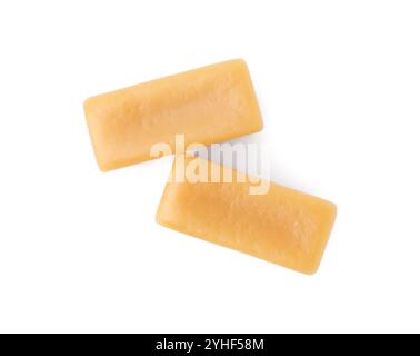 Gustose caramelle dolci isolate sul bianco, vista dall'alto Foto Stock