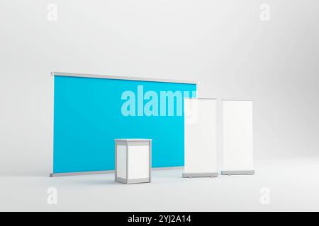 Allestimento minimalista con sfondo blu, due striscioni avvolgibili bianchi e un bancone. Ideale per il branding e l'esposizione professionale in ev Foto Stock