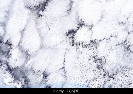 Texture astratta in marmo con vortici bianchi e neri e sottili sfumature di colore. Foto Stock