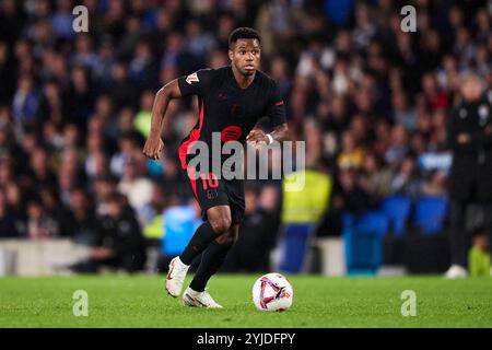 Ansu Fati del FC Barcelona con il pallone durante la partita LaLiga EA Sports tra Real Sociedad e FC Barcelona alla reale Arena il 10 novembre 2024 in Foto Stock