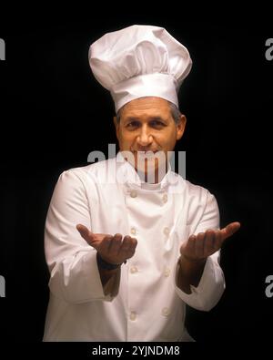 CHEF PROFESSIONALE E ACCOGLIENTE Foto Stock