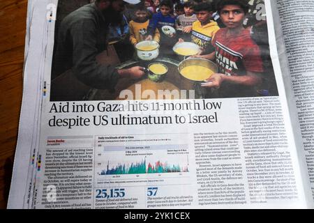 "Gli aiuti a Gaza raggiungono il minimo dell'undicesimo mese nonostante l'ultimatum degli Stati Uniti a Israele", il quotidiano Guardian scrive: Guerra palestinese israeliana articolo 12 novembre 2024 Regno Unito Foto Stock