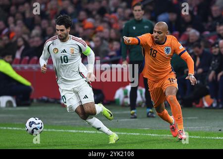 Amsterdam, Germania. 16 novembre 2024. Fussball UEFA Nations League Niederlande - Ungarn am 16.11.2024 in der Johan Cruijff Arena di Amsterdam Dominik Szobozlai ( Ungarn ), links - Donyell Malen ( Niederlande ), rechts foto: Revierfoto crediti: ddp media GmbH/Alamy Live News Foto Stock