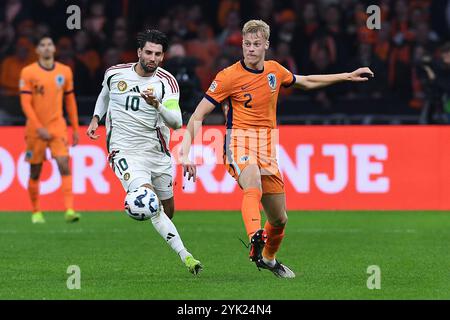 Amsterdam, Germania. 16 novembre 2024. Fussball UEFA Nations League Niederlande - Ungarn am 16.11.2024 in der Johan Cruijff Arena di Amsterdam Dominik Szobozlai ( Ungarn ), Links - Lutsharel Geertruida ( Niederlande ), rechts foto: Revierfoto crediti: ddp media GmbH/Alamy Live News Foto Stock