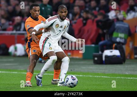 Amsterdam, Germania. 16 novembre 2024. Fussball UEFA Nations League Niederlande - Ungarn am 16.11.2024 in der Johan Cruijff Arena di Amsterdam Loic Nego ( Ungarn ), vorne - Jurrien Timber ( Niederlande ), hinten foto: Revierfoto crediti: ddp media GmbH/Alamy Live News Foto Stock