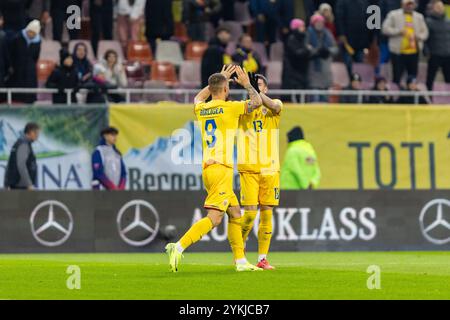 Daniel Birligea di Romania e Valentin Mihaila di Romania festeggiano dopo il primo gol durante la partita di calcio del gruppo C2 della UEFA Nations League, League C, tra Romania e Cipro il 18 novembre 2024 all'Arena Nationala di Bucarest, Romania Foto Stock