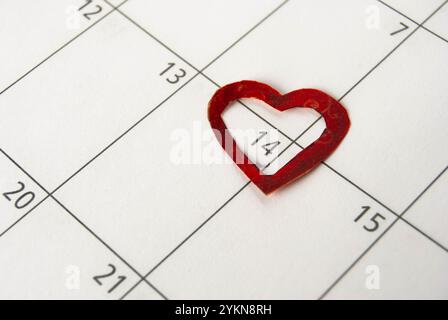 Data di San Valentino evidenziata con un cuore, perfetta per temi di amore e celebrazione. Foto Stock