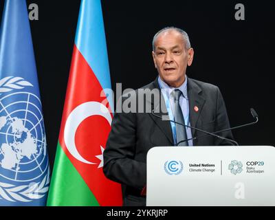 Baku, Azerbaigian, 19 novembre 2024. Habib Abid, ministro dell'ambiente tunisino, rilascia una dichiarazione nazionale durante la ripresa del segmento ad alto livello nella sala plenaria di Nizami nella zona blu durante la conferenza delle Nazioni Unite sui cambiamenti climatici COP29, un evento tenuto dall'UNFCCC allo stadio olimpico di Baku. La COP29, in vigore da novembre 11-22, si concentra sulla ricerca di energia pulita per la compensazione delle emissioni di carbonio. Foto Stock