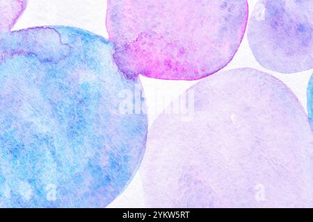 Vivaci cerchi di acquerello in tonalità pastello di blu, viola e rosa. Foto Stock
