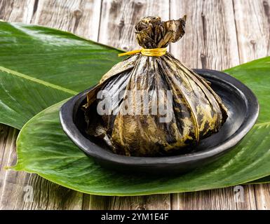 Il tamal è un alimento di origine precolombiana - Tolima, Colombia. Foto Stock