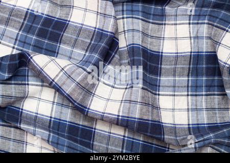 Un tessuto a scacchi blu e bianco in una vista ravvicinata Foto Stock