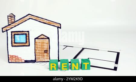 Scrittura AFFITTO investimenti immobiliari. Concetto di gestione patrimoniale finanziaria progettazione di edifici. Foto Stock