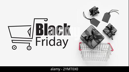 Banner per i saldi del Black Friday con carrello, regali ed etichette Foto Stock