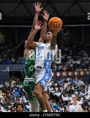 Honolulu, Hawaii, Stati Uniti. 22 novembre 2024. La guardia del North Carolina Elliot Cadeau (3) spara la palla durante la partita di basket NCAA del 2024 tra i North Carolina Tar Heels e i Rainbow Warriors della University of Hawaii alla SimpliFi Arena allo Stan Sheriff Center di Honolulu, Hawaii. Glenn Yoza/CSM/Alamy Live News Foto Stock