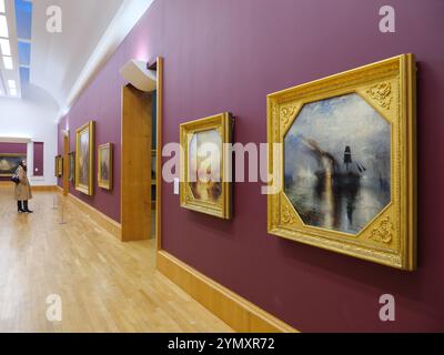I dipinti di J.M.W Turner appesi alle Turner Rooms della galleria d'arte Tate Britain, Londra, Regno Unito Foto Stock