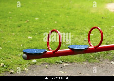 Potrai sederti in un parco giochi per bambini Foto Stock