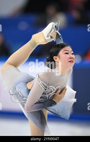 China's an Xiangyi è nel concorso femminile single.Chongqing, Cina.22 novembre 2024. Il Gran Premio del mondo di pattinaggio di figura della Coppa della Cina 2024 prende il via a Chongqing, attirando 60 pattinatori di figura da 16 paesi e regioni, il 22 novembre 2024. Credito: He Penglei/China News Service/Alamy Live News Foto Stock