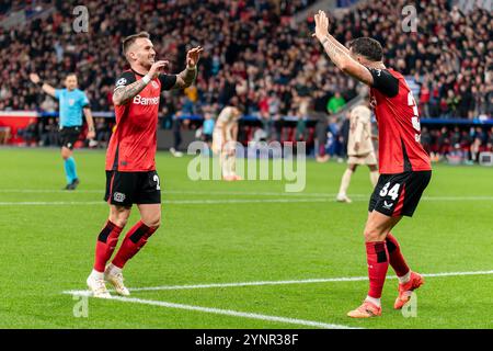 Leverkusen, Germania. 26 novembre 2024. LEVERKUSEN, GERMANIA - NOVEMBRE 26: Aleix Garcia del Bayer 04 Leverkusen festeggia dopo aver segnato il quinto gol della squadra con Granit Xhaka del Bayer 04 Leverkusen durante la fase MD5 di UEFA Champions League 2024/25 tra Bayer 04 Leverkusen e FC Salzburg al BayArena il 26 novembre 2024 a Leverkusen, Germania. (Foto di Joris Verwijst/Orange Pictures) credito: Orange Pics BV/Alamy Live News Foto Stock