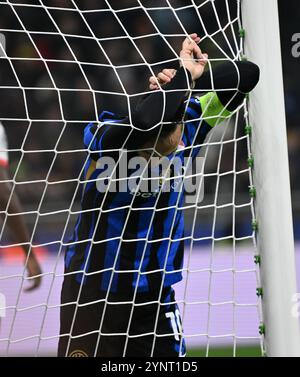 Milano, Italia. 26 novembre 2024. Il Lautaro Martinez di Inter Milan reagisce durante la partita di fase di campionato tra Inter Milan e RB Leipzig alla UEFA Champions League di Milano, Italia, 26 novembre 2024. Crediti: Alberto Lingria/Xinhua/Alamy Live News Foto Stock