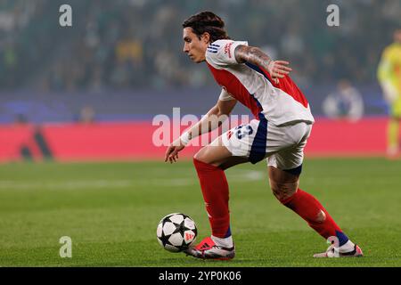 Lisbona, Portogallo. 26 novembre 2024. Riccardo Calafiori (Arsenal FC) visto in azione durante la partita di UEFA Champions League tra le squadre dello Sporting CP e dell'Arsenal FC allo stadio Jose Alvalade. Punteggio finale : Sporting CP 1: 5 Arsenal FC. (Foto di Maciej Rogowski/SOPA Images/Sipa USA) credito: SIPA USA/Alamy Live News Foto Stock