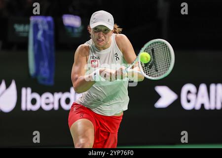 28 novembre 2024: La seconda campionessa mondiale e cinque volte campione del grande Slam IGA SWIATEK ha accettato una sospensione di un mese dopo essere risultata positiva per una sostanza vietata. La ventitreenne campionessa in carica dell'Open di Francia è risultata positiva per un farmaco per il cuore, la trimetazidina in un campione fuori concorso nell'agosto 2024, quando era la numero uno del mondo. L'ITIA ha accettato di essere causata da una contaminazione della melatonina regolamentata senza prescrizione medica, prodotta e venduta in Polonia, che Swiatek ha preso per problemi di jet lag e sonno. FOTO DEL FILE: 16 novembre 2024, Malaga, Spagna: Swiatek at 2024 Billie Foto Stock