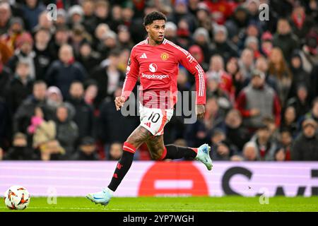 Manchester, Regno Unito. 28 novembre 2024. Old Trafford MANCHESTER, INGHILTERRA - NOVEMBRE 28: Marcus Rashford del Manchester United corre con la palla durante la fase MD5 della UEFA Europa League 2024/25 tra il Manchester United e il FK Bodo/Glimt all'Old Trafford il 28 novembre 2024 a Manchester, Inghilterra. (Richard Callis/SPP) credito: SPP Sport Press Photo. /Alamy Live News Foto Stock