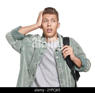 Studente emotivo che ha stress prima dell'esame su sfondo bianco Foto Stock